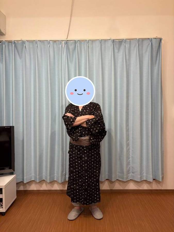 腕を組んでポーズ